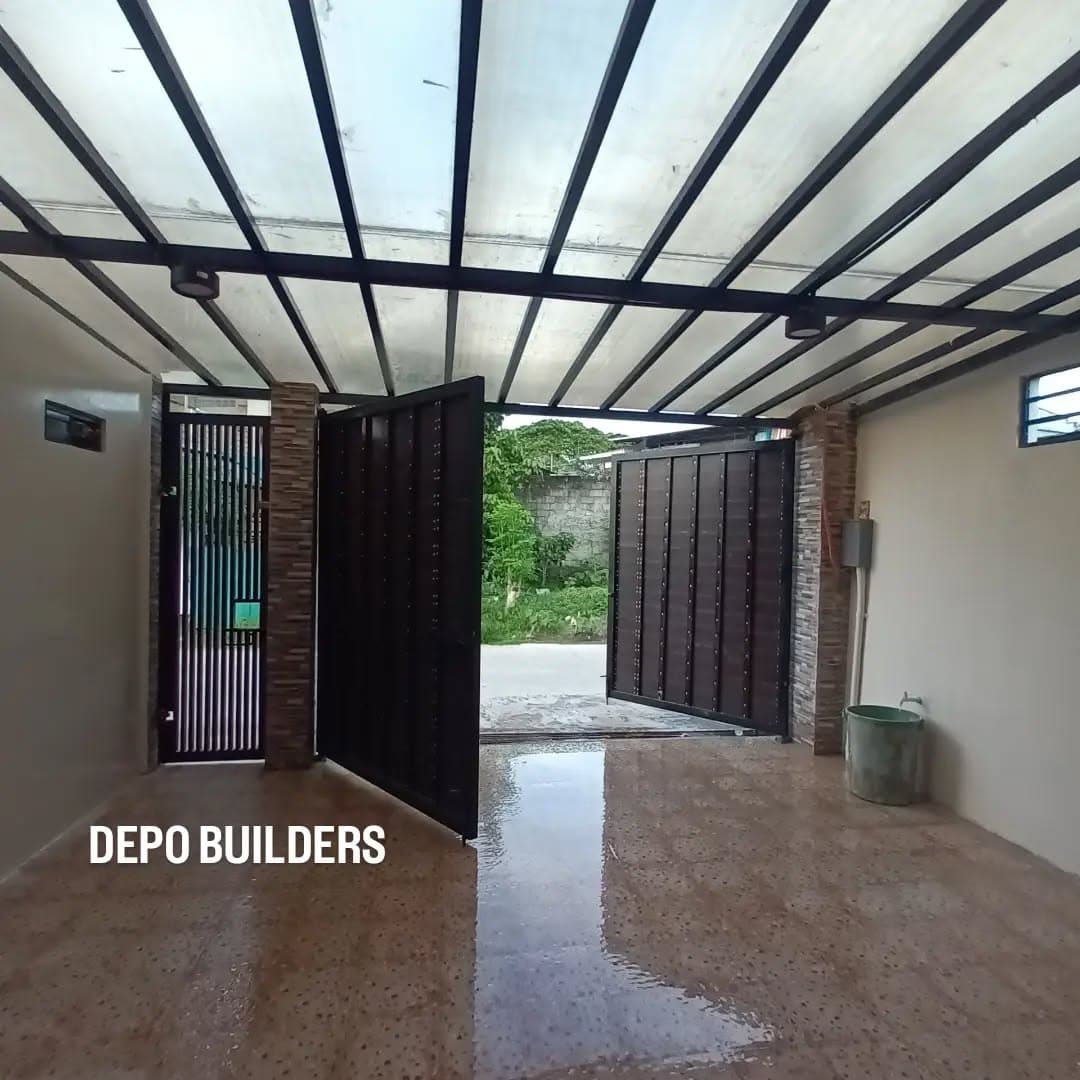 Carport with a steel frame, translucent roof, and pebble-wash floor